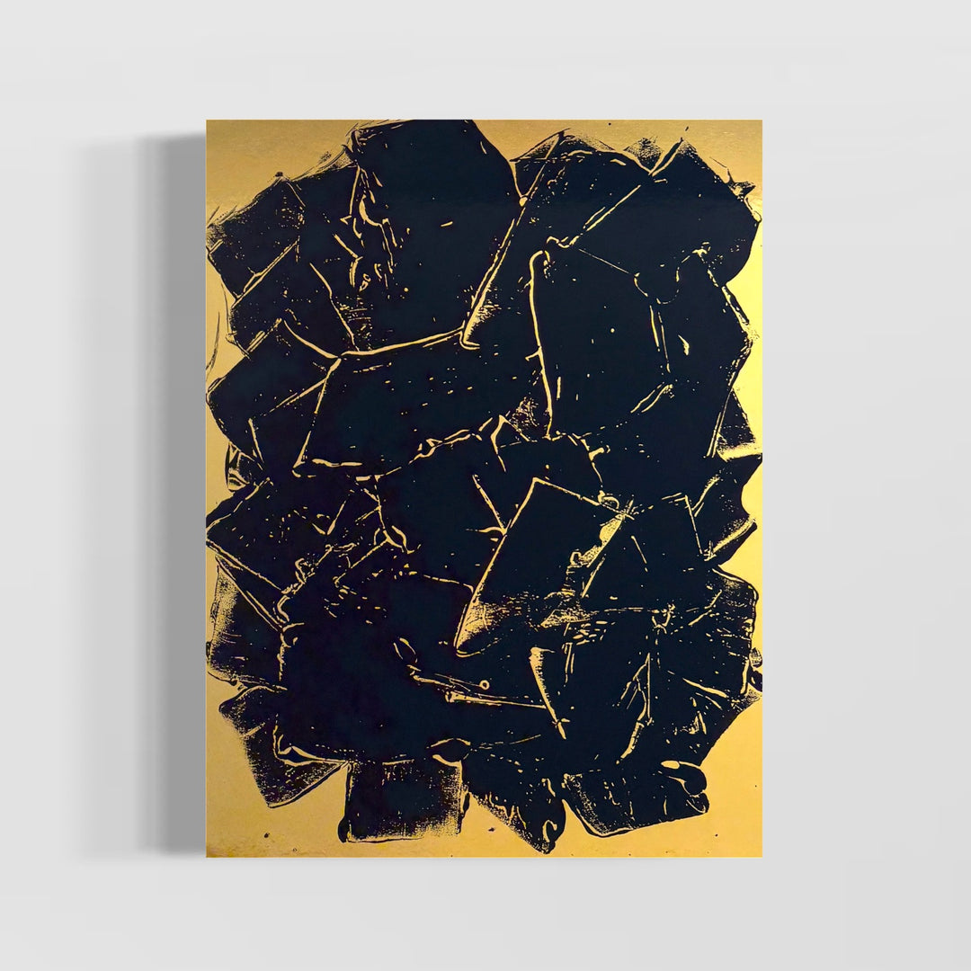 expressionistic swatches in many directionsof black paint on shiny gold foil smooth surface by artist m clark