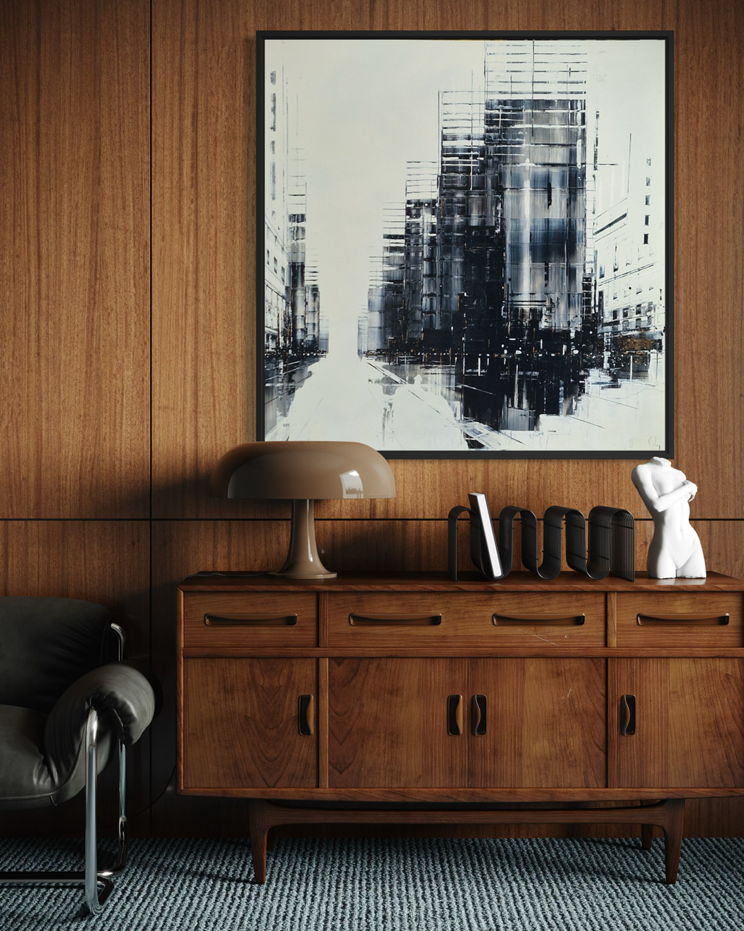 Julien Rey, Voyage, lacquer and gold leaf on board, 40 x 40 inches, shown framed above a wood credenza in a mid-century-style living room with a black leather chair, table lamp, books, and a white sculptural bust.