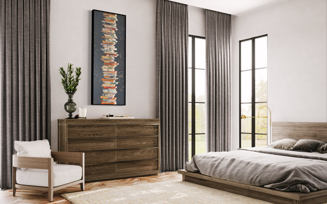 Equilibrium IV, artwork by Tomasa Martín, 29" x 77". Oil and acrylic on linen, vertical painting of stacked books on a charcoal gray background.
