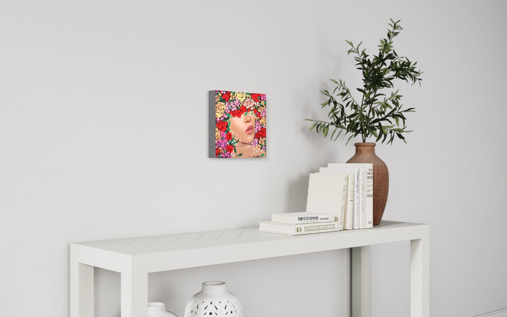 In Full Bloom VI, artwork by Sally K., displayed in a home. Acrylic paint on canvas. 12 by 12 inches.