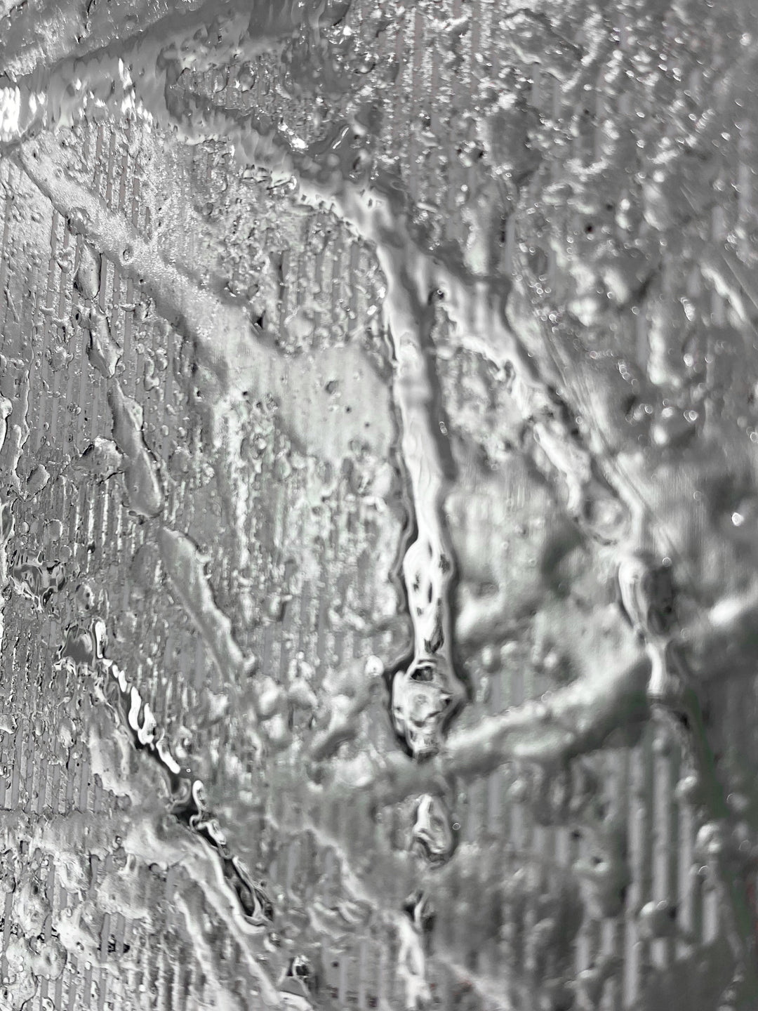 Detail of M. Clark "Silver Texture No. 35". Silver foil on illustration board mounted to 10.5"x8"x0.5" sintra panel. Abstract silver textural painting.