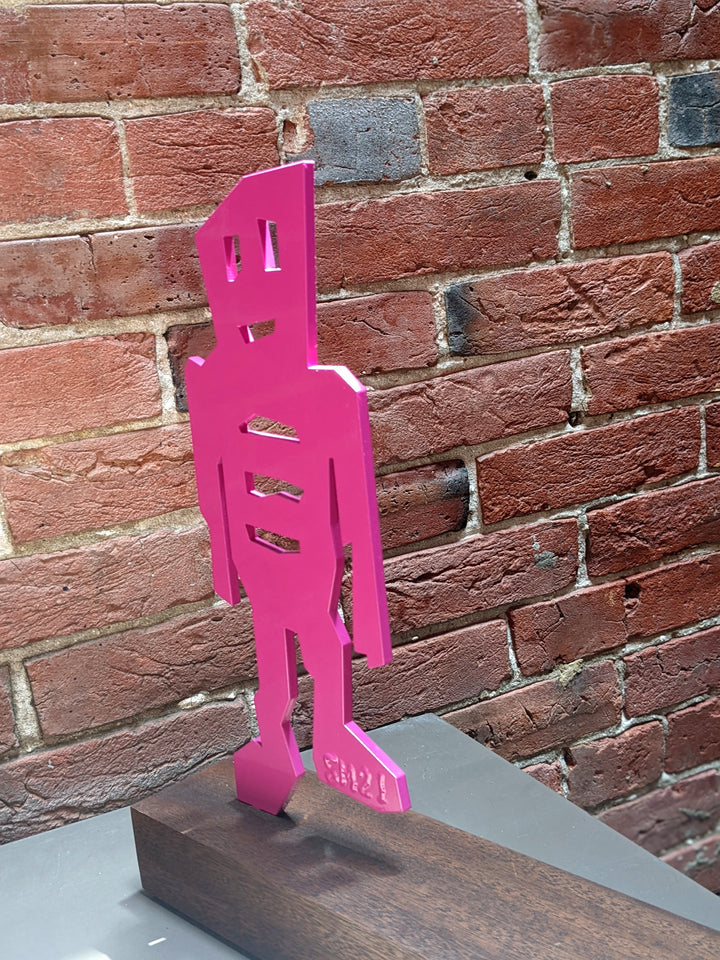 detail of The Wanderer, sculpture by Stikman. Laser-cut powder coated steel. 13 inches tall.