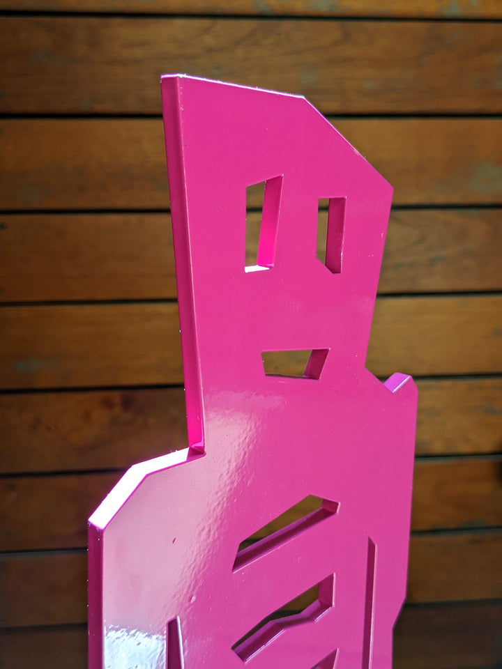 detail of The Wanderer, sculpture by Stikman. Laser-cut powder coated steel. 13 inches tall.