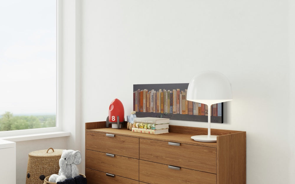 Books and Headphones, artwork by Tomasa Martín. Oil and acrylic on linen, horizontal painting of lots of books next to each other and a pair of headphones.